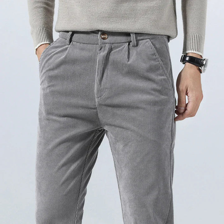 Men's tailored corduroy trousers featuring a modern fit, soft premium fabric, and versatile design, ideal for any occasion.