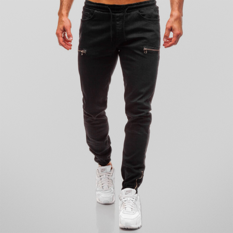 Trendy denim joggers for men perfect for summer, featuring a tapered fit, stretchy denim fabric, and casual streetwear style.
