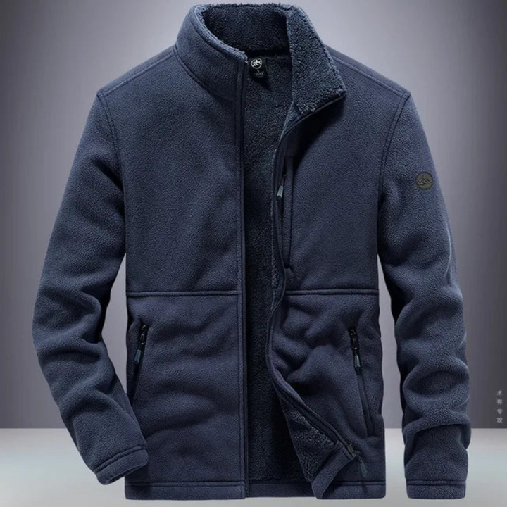 Man wearing a warm cozy fleece jacket, ideal for staying comfortable and stylish on cool autumn days.