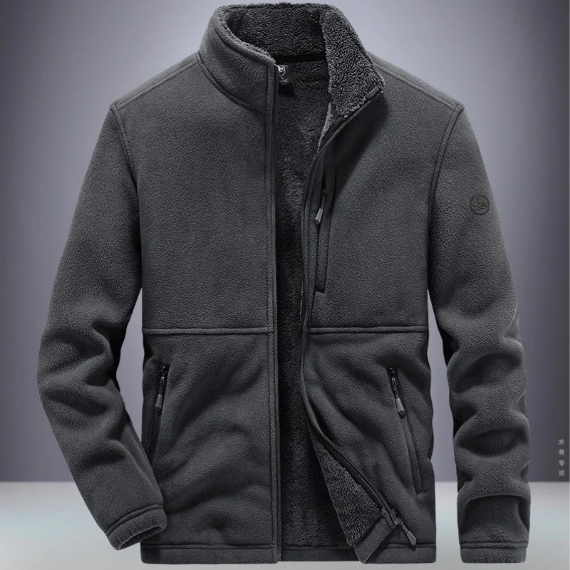 Man wearing a warm cozy fleece jacket, ideal for staying comfortable and stylish on cool autumn days.