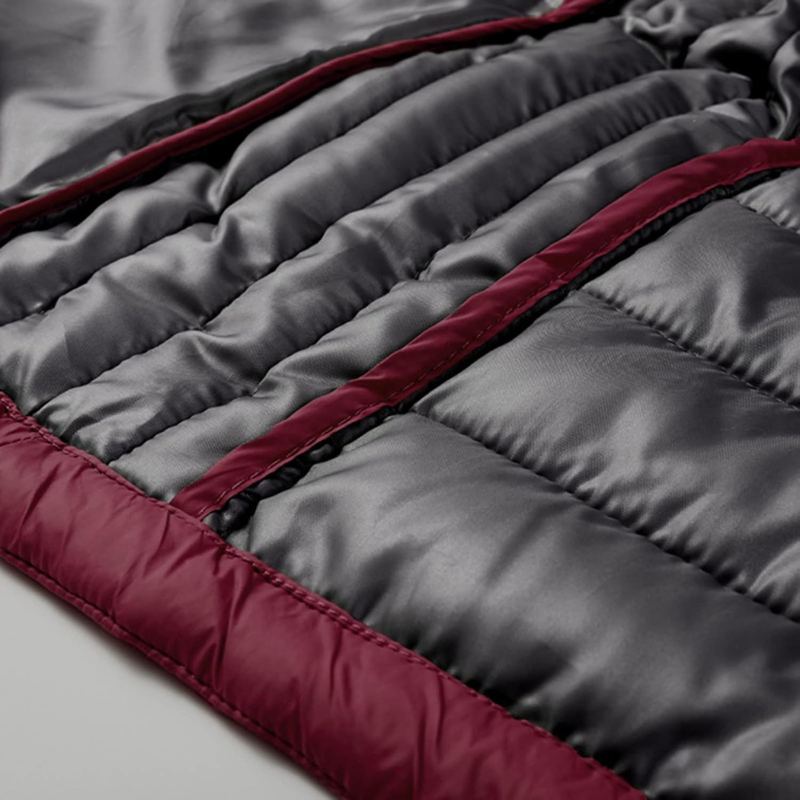 Waterproof men's puffer jacket, designed for warmth and protection on chilly autumn days.
