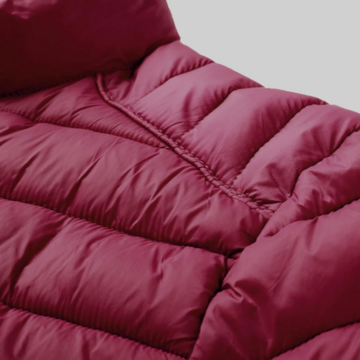 Waterproof men's puffer jacket, designed for warmth and protection on chilly autumn days.
